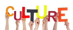Many Hands Holding the Colorful Word Culture, Isolated